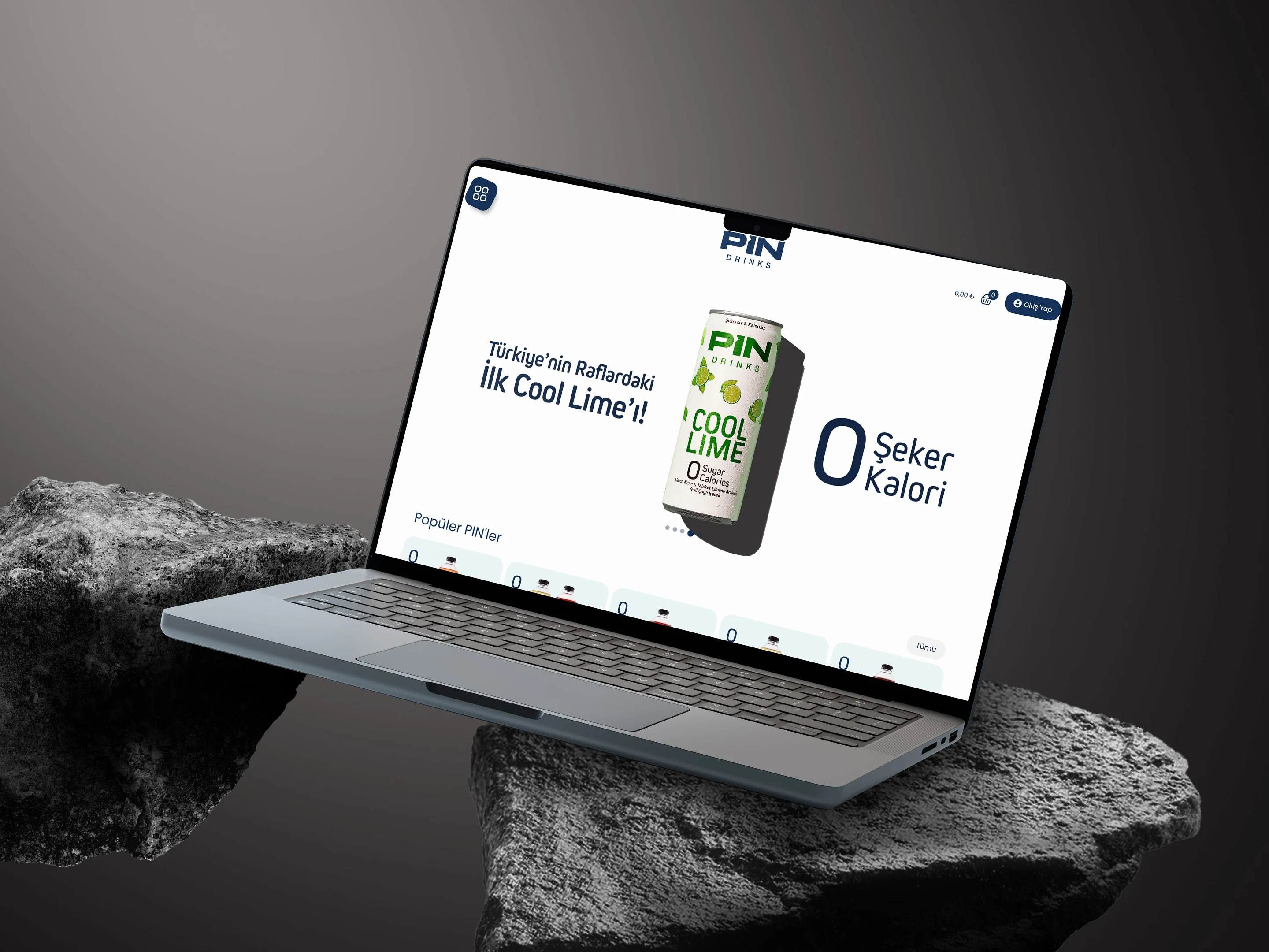 Pin Drinks website home page on a laptop