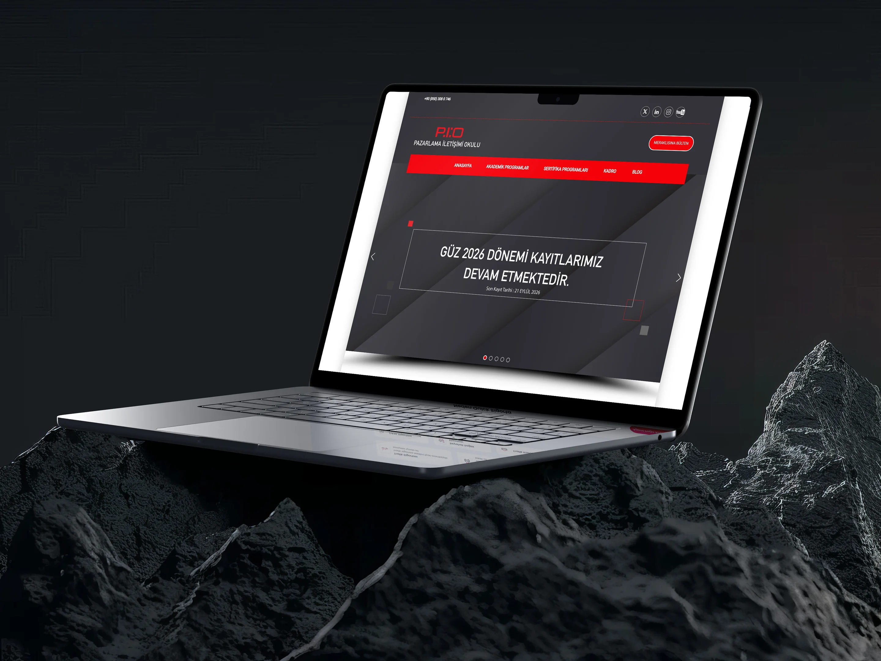 School of Marketing Communication website on a laptop